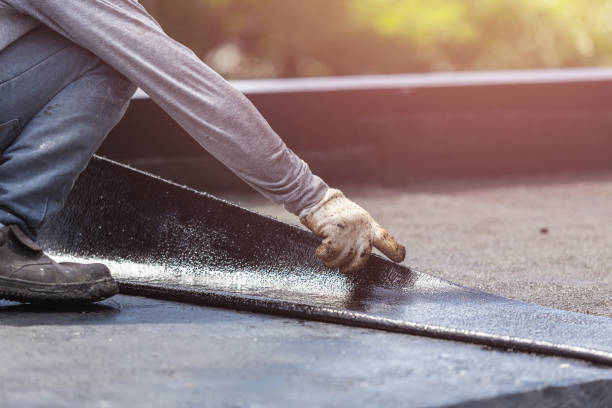 Professional Basement Waterproofing technician working in Sardinia, OH